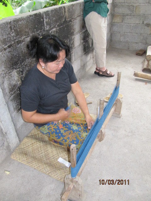 The ikat threads are then wound on shuttles for the weavers. In this case the fabric will be a solid color. Often the warp is one color and the weft is another to add depth, beauty and interest.